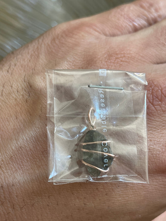 Moldavite pendant, set in a copper wire setting