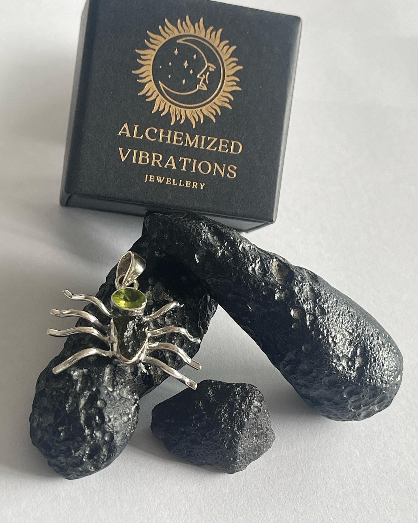 Moldavite and Peridot spider pendant, set in pure sterling silver